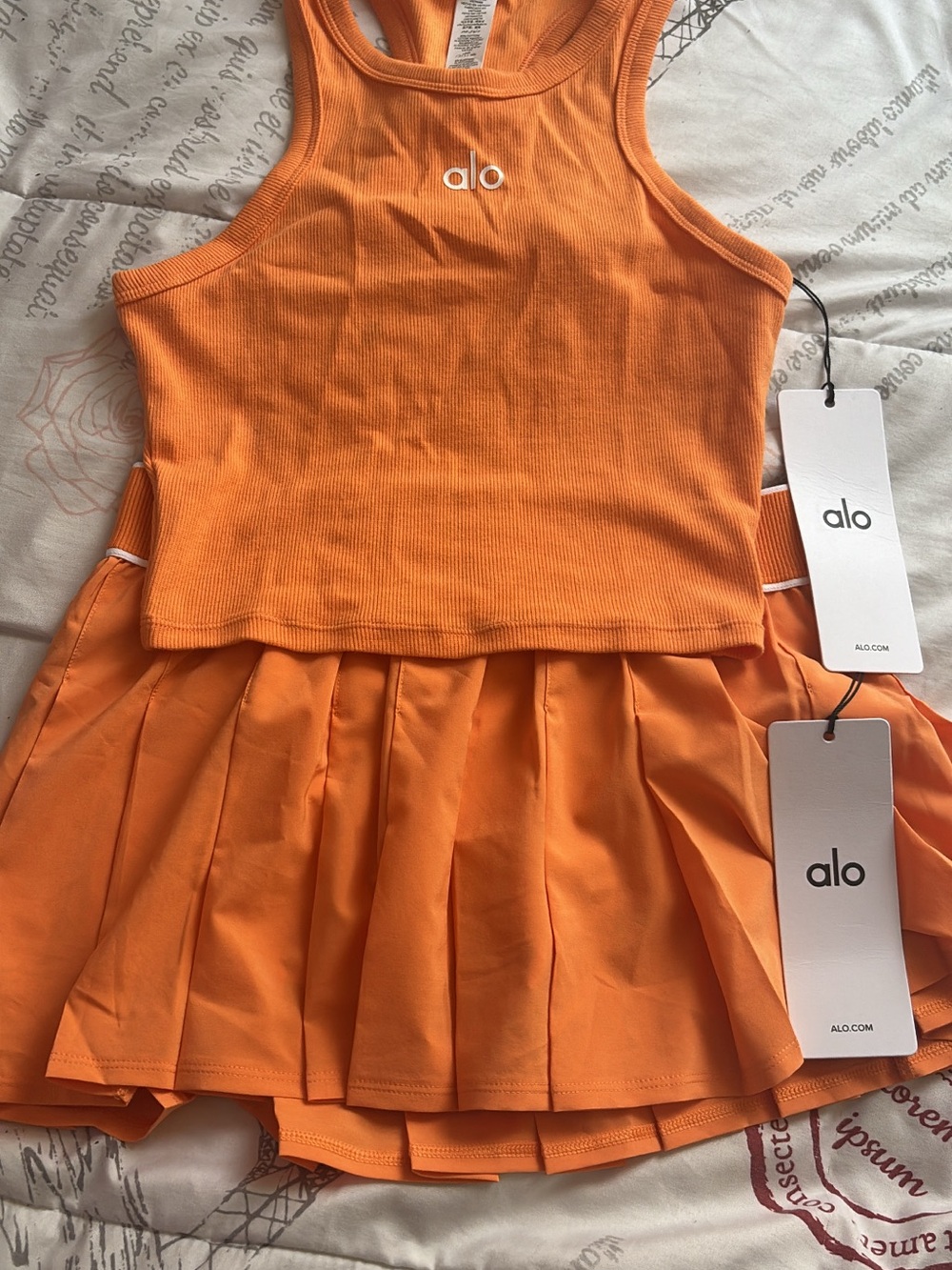 ALO Yoga Girls Bright Orange Ribbed Tank and Pleated Skirt Set